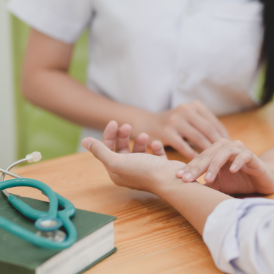 Provider communicating with patient, an aspect of building a patient relationship and improving patient satisfaction.