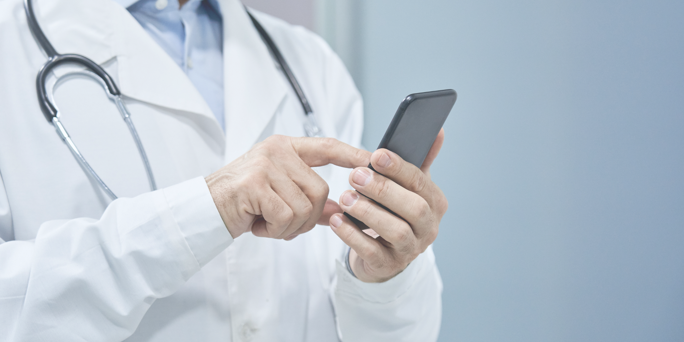 Healthcare provider texting patient information securely to another doctor which is now allowed by CMS