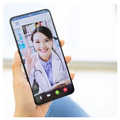 Image of a doctor having a telemedicine consultation with a patient via OhMD telehealth on a smartphone