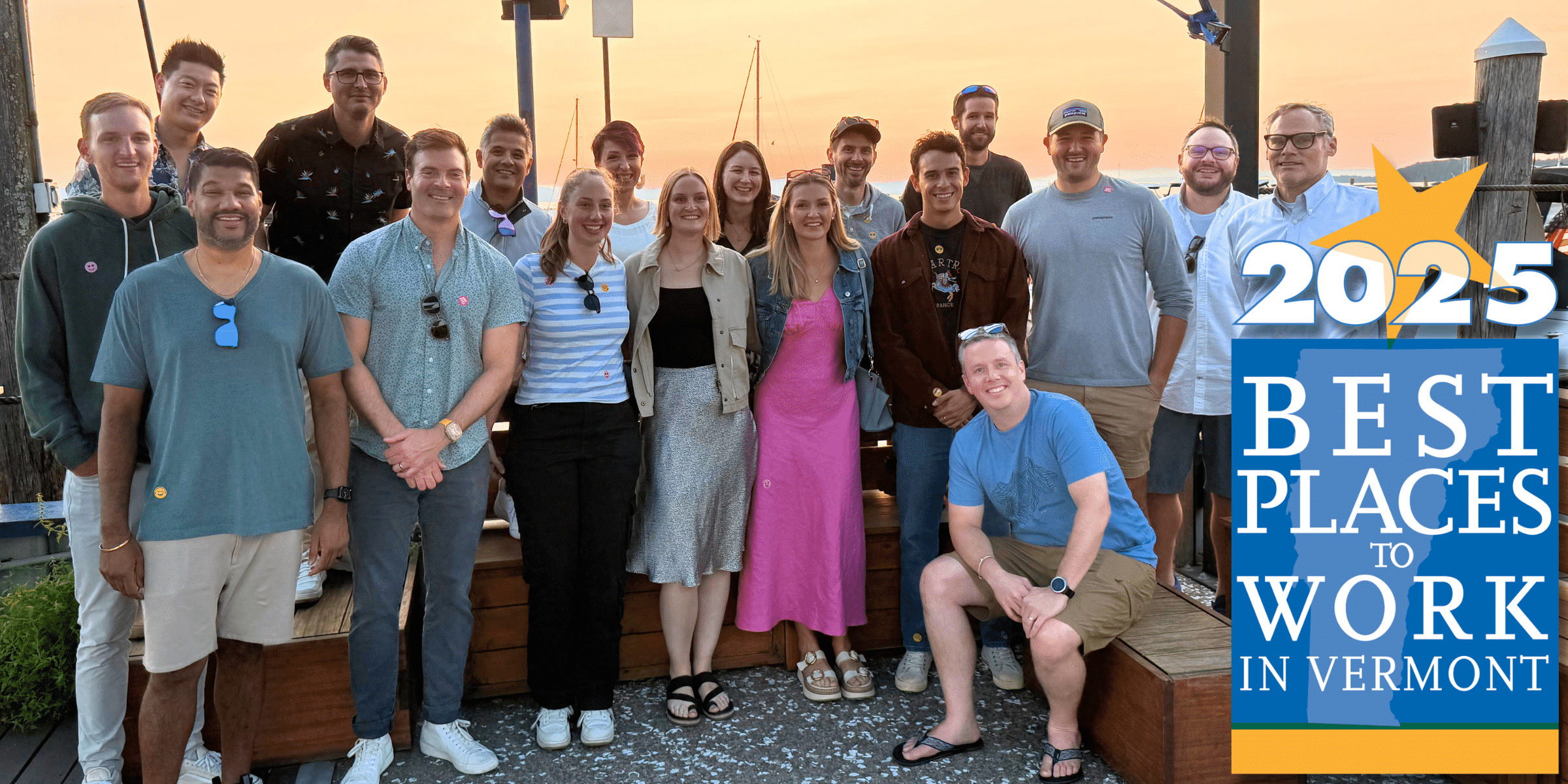 OhMD group photo on a pier at sunset
